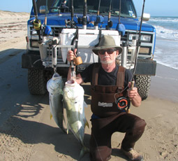 Capt Billy with two Jack Crevelle caught on a fly rod March 16 on Padre Island Corpus Christi