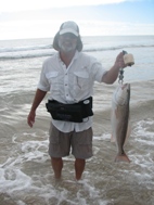 Louis Dubois of Corpus Christi with an oversized red on a topwater on Big Shell